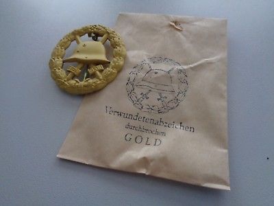 A10-210-Verwundeten-Abzeichen-gold-57er-Ausführung-durchstochen-WWI.jpg